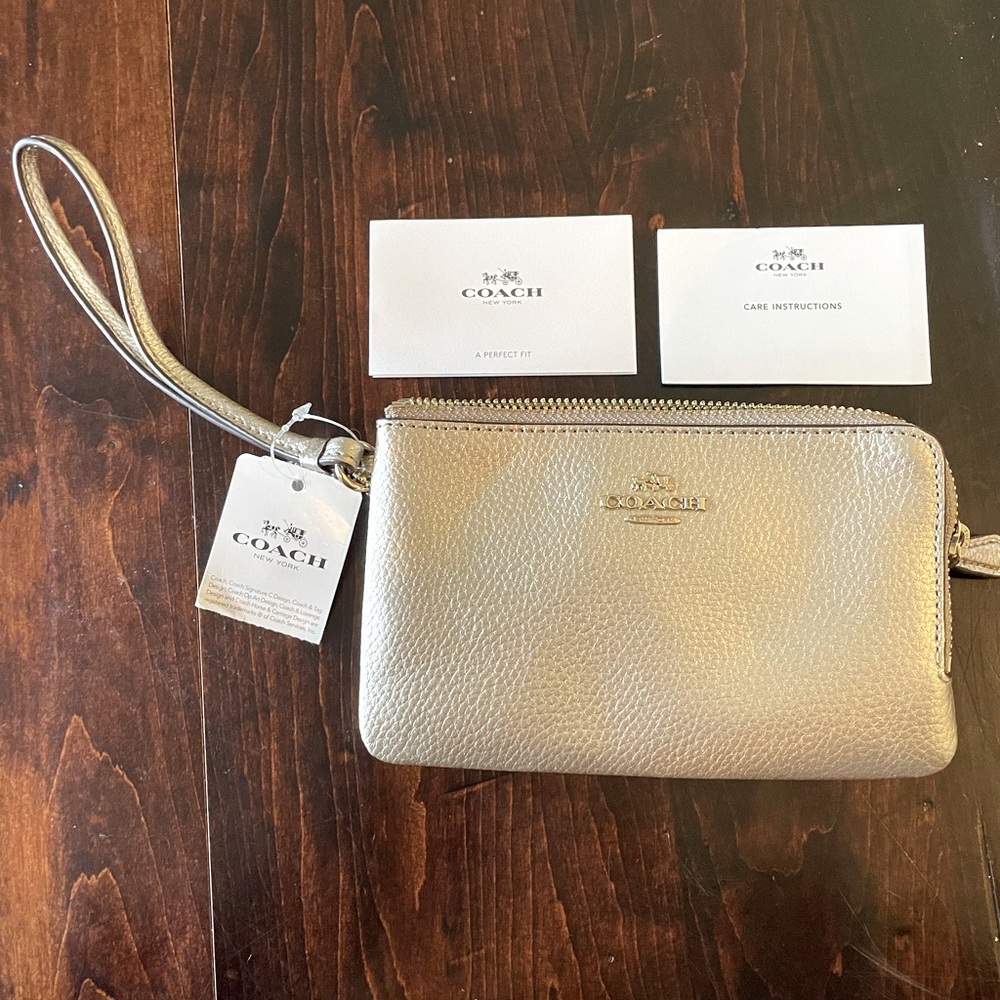 Metallic Coach wristlet